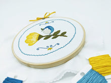 Load image into Gallery viewer, 6 inch embroidery kit with hoop, ribbon, DMC floss. Bird on a flower theme using satin stitch, stem stitch, back stitch and straigth stitch. Needlework is simple and includes needle and ironed on pattern.