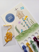Load image into Gallery viewer, This kit includes DMC thread, needle, ribbon and thread organizer card. Colors are blue, yellow, mint green, burgundy and cream.