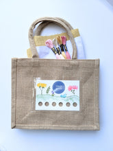 Load image into Gallery viewer, Jute bag embroidery kit includes cotton fabric and DMC thread.