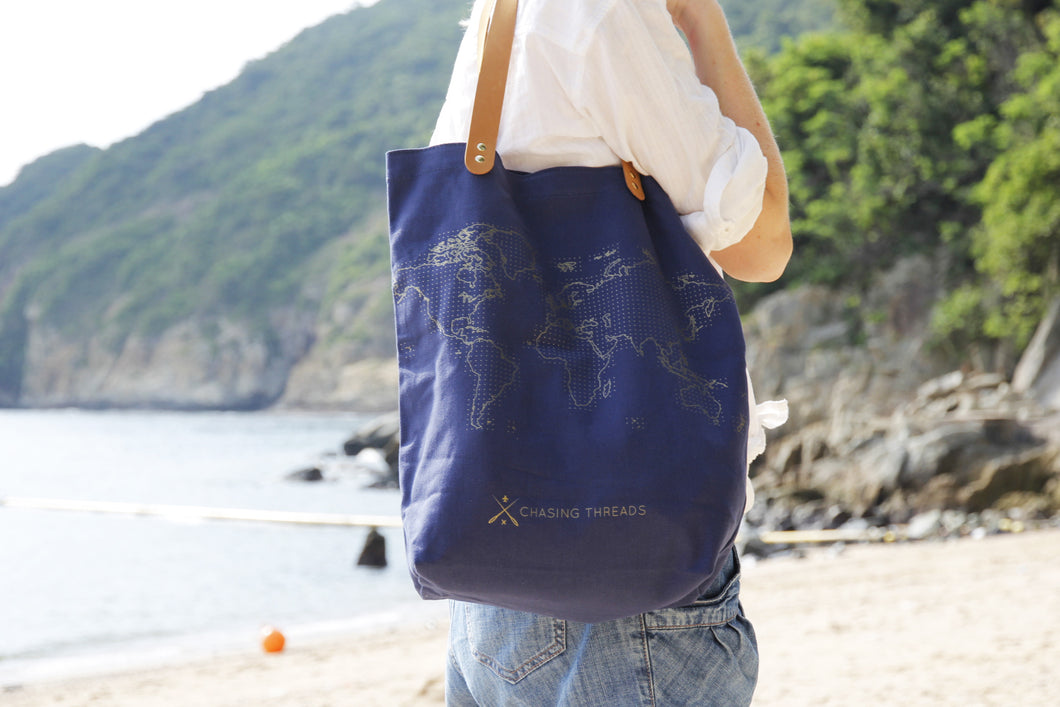 Navy Canvas leather tote made in London. Stitch your travels from around the world tote. Includes thread.
